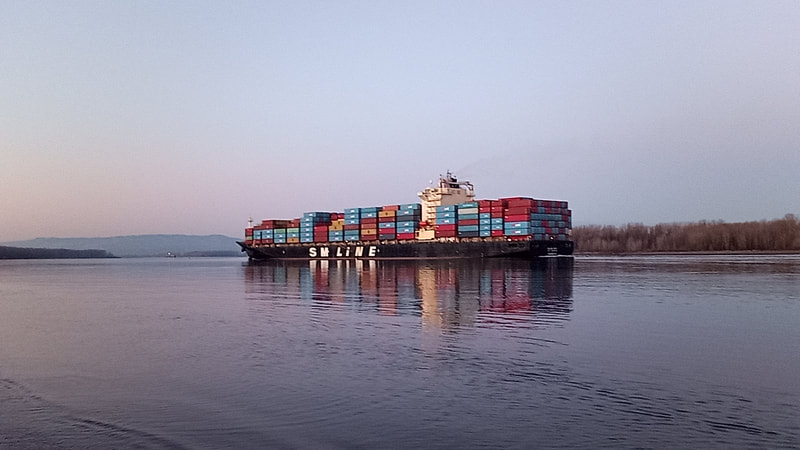 SM Line Cargo Ship fresh from the Port of Portland, sailing down the Columbia River in February 2022